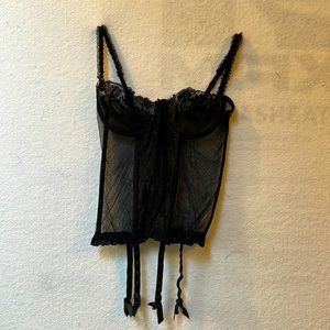 Black Jezebel lace and mesh bustier with garter straps. 36C.